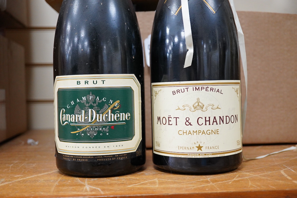 A Magnum bottle of Moet & Chandon champagne and a Magnum Canard-Duchene
